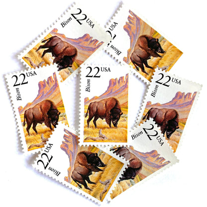 Image of 1987 North American Wildlife Series “Bison” 22-cent vintage unused USPS mail stamps. Scott #2320. Stamp Themes: Wildlife, Nature, Buffalo, Bison, Tatanka, Herd, Grazing, Prairie, Grasslands, University of Colorado Boulder Ralphie, Colorado, Wyoming, Yellowstone, Grand Tetons, Conservation. Brown, Yellow/Gold, Pink, Multicolored postage stamp. Perfect vintage postage stamp to use for save the date announcements, wedding invitation postage, shower invitations, thank you cards, and snail mail.