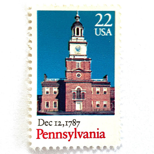 Image of Pennsylvania Statehood postage stamp from the 1987 Bicentenary Statehood series, featuring Philadelphia’s Independence Hall on vintage unused 22-cent USPS postage, Scott 2337.