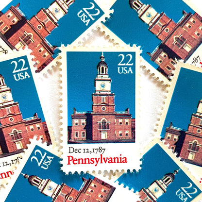 Image of Pennsylvania Statehood postage stamps from the 1987 Bicentenary Statehood series, featuring Philadelphia’s Independence Hall on vintage unused 22-cent USPS postage, Scott 2337.