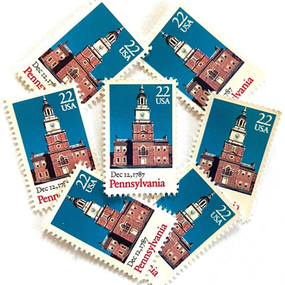 Image of Pennsylvania Statehood postage stamps from the 1987 Bicentenary Statehood series, featuring Philadelphia’s Independence Hall on vintage unused 22-cent USPS postage, Scott 2337.