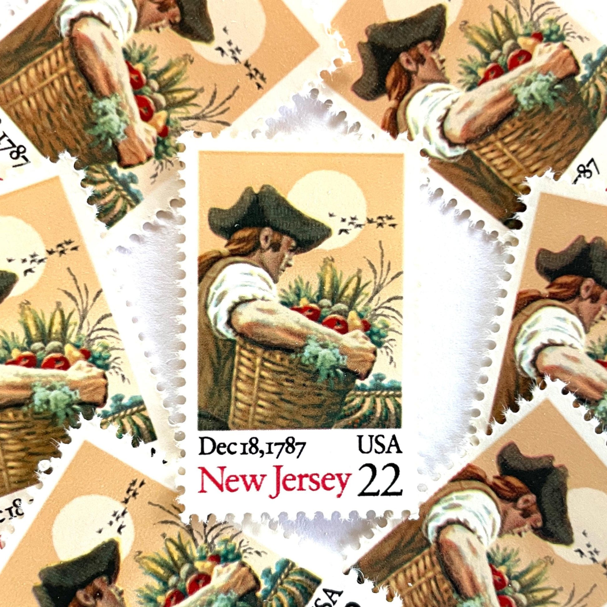 Image of New Jersey Statehood postage stamps from the 1987 Bicentenary Statehood series, featuring a farmer carrying a basket of produce on vintage unused 22-cent USPS postage, Scott 2338.