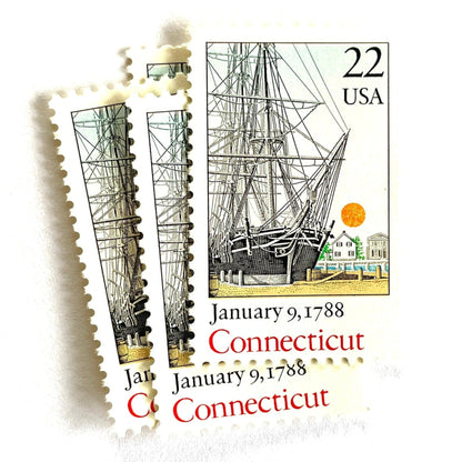 Image of Connecticut Statehood postage stamps from the 1988 Bicentenary Statehood series, featuring the historic Charles W. Morgan ship in Mystic Harbor on vintage unused 22-cent USPS postage, Scott 2340.