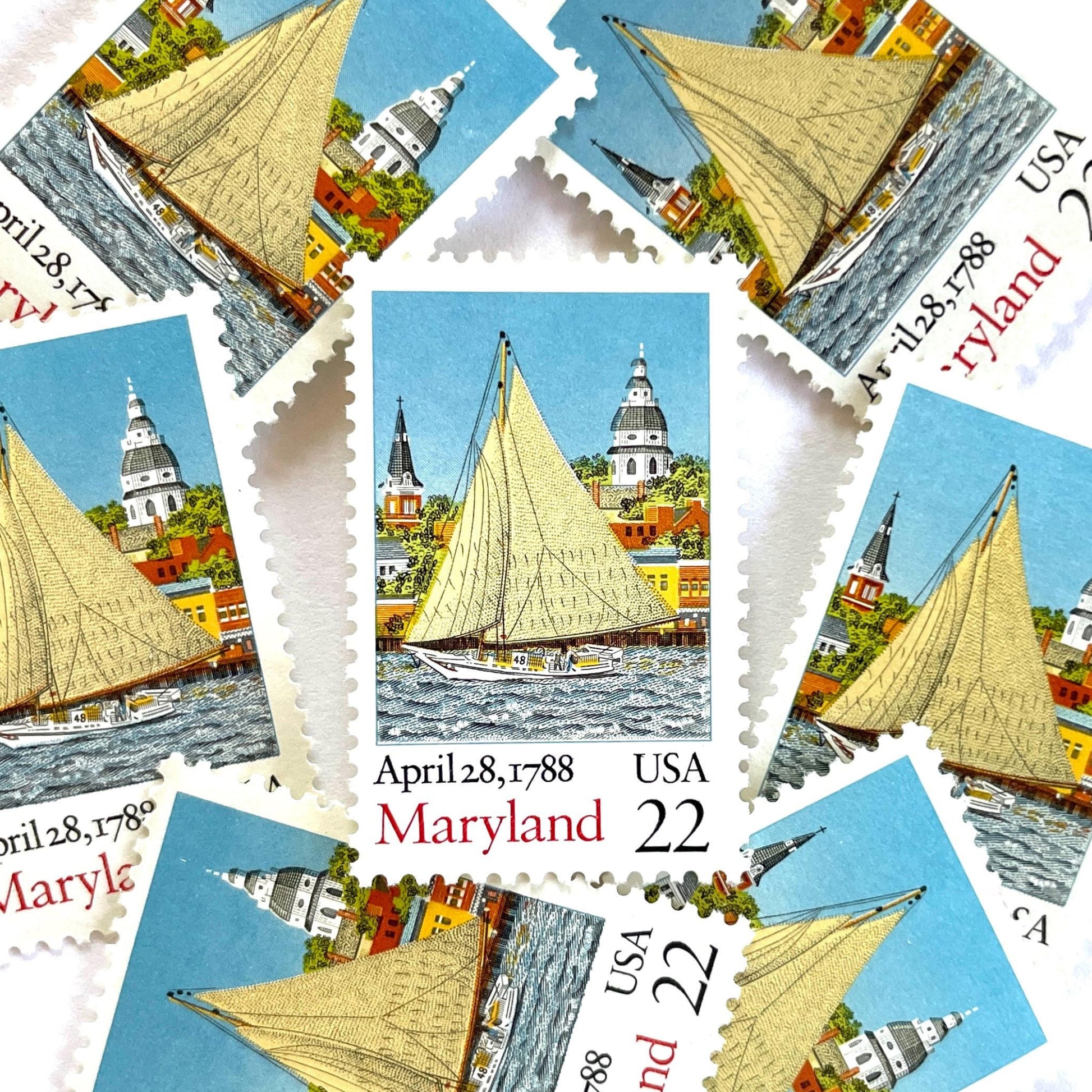 Image of Maryland Statehood postage stamps from the 1988 Bicentenary Statehood series, featuring the State House, a skipjack sailing on Chesapeake Bay in Annapolis and other historic Maryland statehood imagery on vintage unused 22-cent USPS postage, Scott 2342.