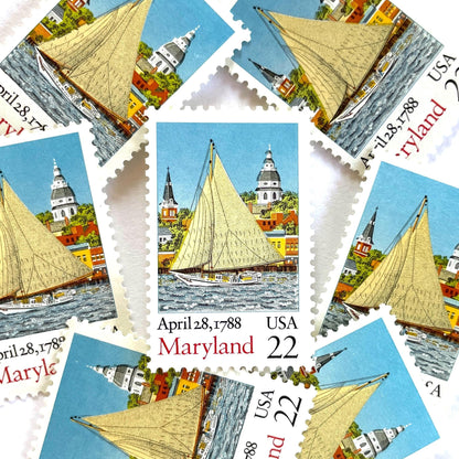 Image of Maryland Statehood postage stamps from the 1988 Bicentenary Statehood series, featuring the State House, a skipjack sailing on Chesapeake Bay in Annapolis and other historic Maryland statehood imagery on vintage unused 22-cent USPS postage, Scott 2342.