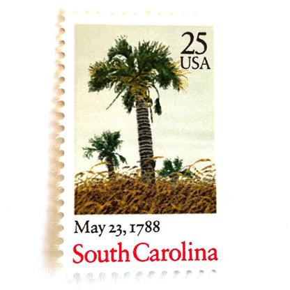 Image of South Carolina Statehood postage stamps from the 1988 Bicentenary Statehood series, featuring green palmetto trees and sea oats on vintage unused 25-cent USPS postage, Scott 2343.