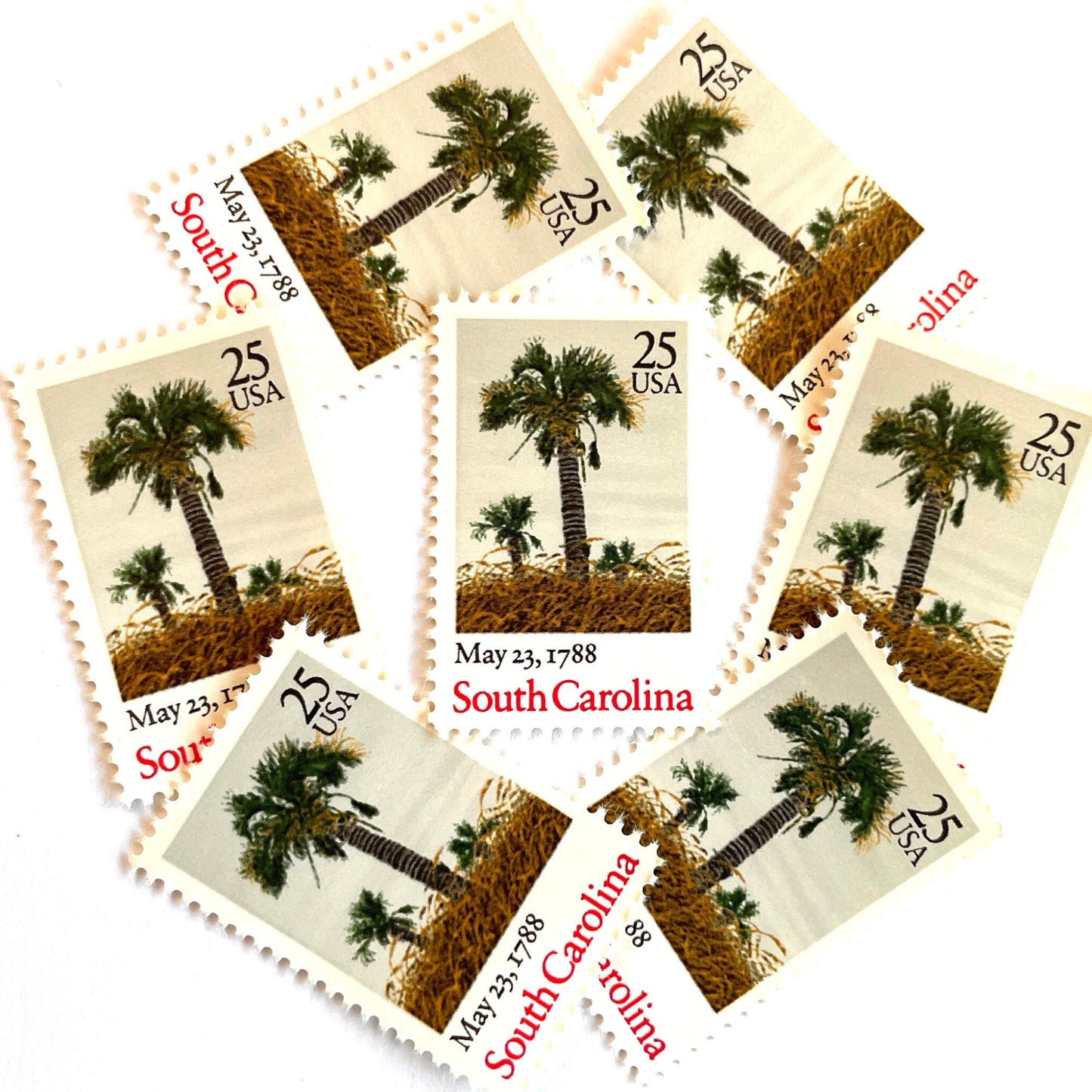 Image of South Carolina Statehood postage stamps from the 1988 Bicentenary Statehood series, featuring green palmetto trees and sea oats on vintage unused 25-cent USPS postage, Scott 2343.