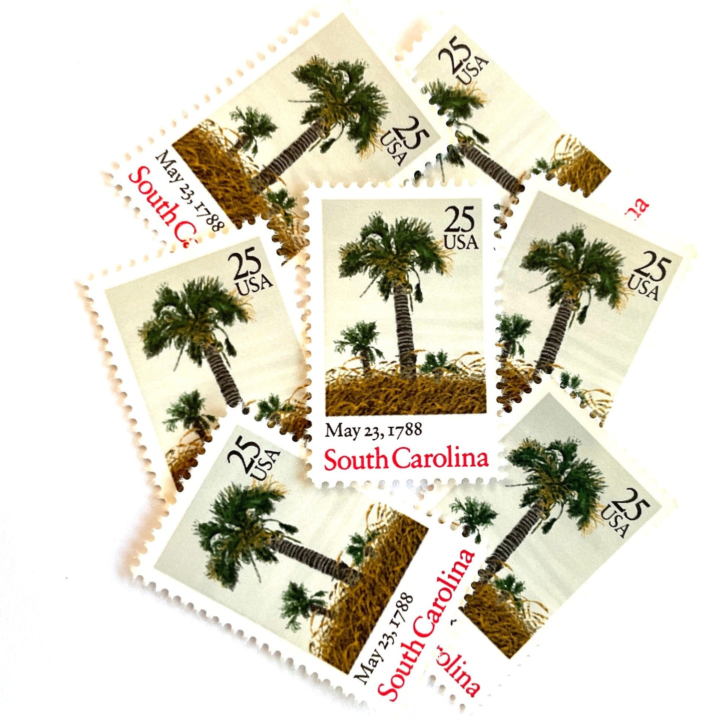 Image of South Carolina Statehood postage stamps from the 1988 Bicentenary Statehood series, featuring green palmetto trees and sea oats on vintage unused 25-cent USPS postage, Scott 2343.