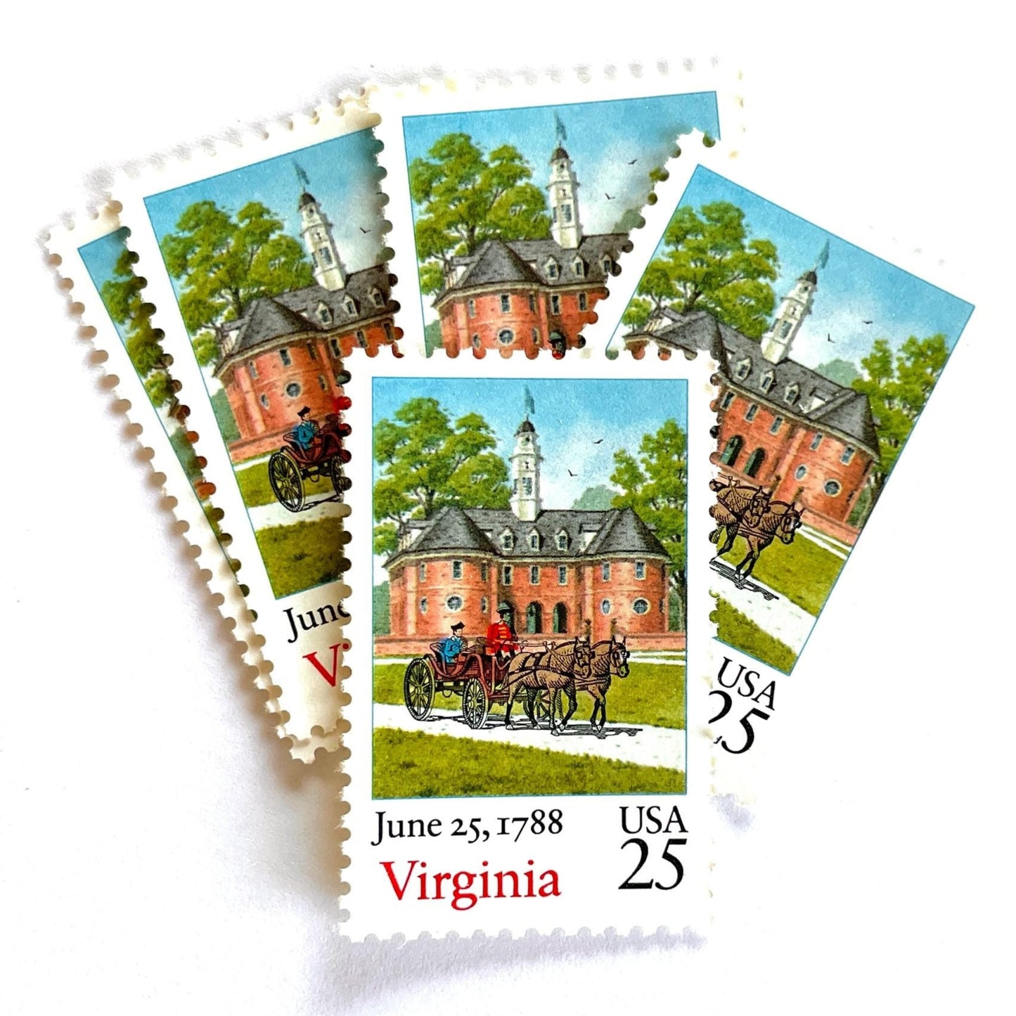 Image of Virginia Statehood postage stamps from the 1988 Bicentenary Statehood series, featuring a horse-drawn carriage before the Williamsburg Capitol on vintage unused 25-cent USPS postage, Scott 2345.