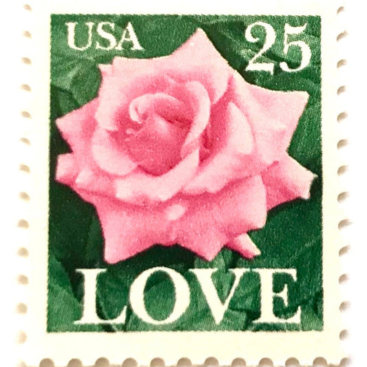 Vintage Love Rose postage stamp from the 1988 USPS Love series featuring a pink rose against dark green foliage on unused 25-cent USPS postage, Scott 2378.