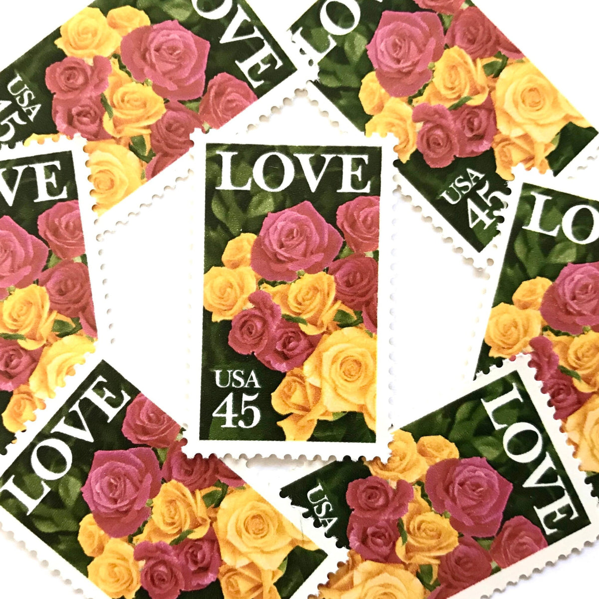 Pink & Yellow Roses postage stamps from 1988 featuring a bouquet of pink and yellow roses on vintage unused 45-cent USPS postage, Scott 2379.