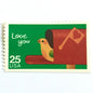 Love You postage stamp from 1988 featuring a bird peeking from an open mailbox against a green background on vintage unused 25-cent USPS postage, Scott 2398.