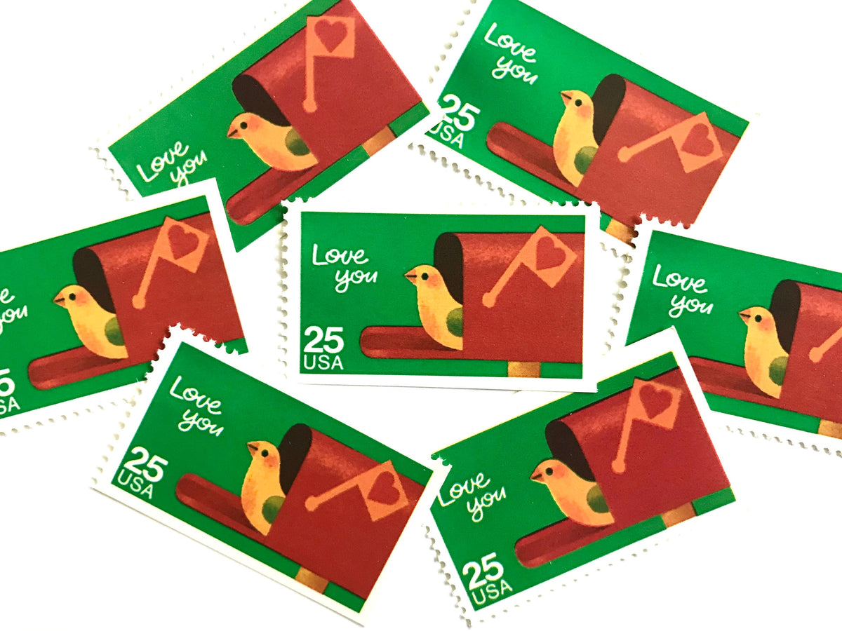 Love You postage stamps from 1988 featuring a bird peeking from an open mailbox against a green background on vintage unused 25-cent USPS postage, Scott 2398.