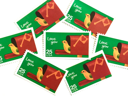 Love You postage stamps from 1988 featuring a bird peeking from an open mailbox against a green background on vintage unused 25-cent USPS postage, Scott 2398.