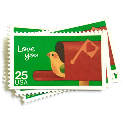 Love You postage stamps from 1988 featuring a bird peeking from an open mailbox against a green background on vintage unused 25-cent USPS postage, Scott 2398.