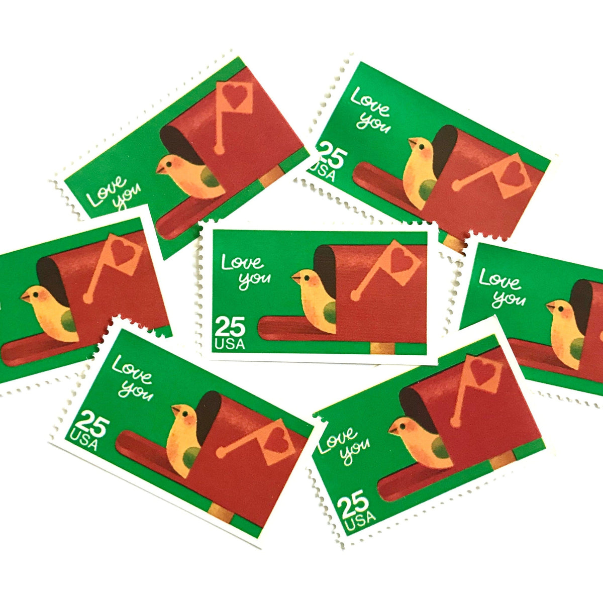 Love You postage stamps from 1988 featuring a bird peeking from an open mailbox against a green background on vintage unused 25-cent USPS postage, Scott 2398.