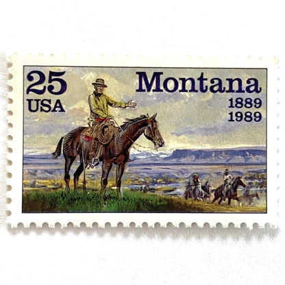 Image of Montana Statehood postage stamps from 1989, featuring C.M. Russell Western art with a cowboy on horseback and riders on vintage unused 25-cent USPS postage, Scott 2401.