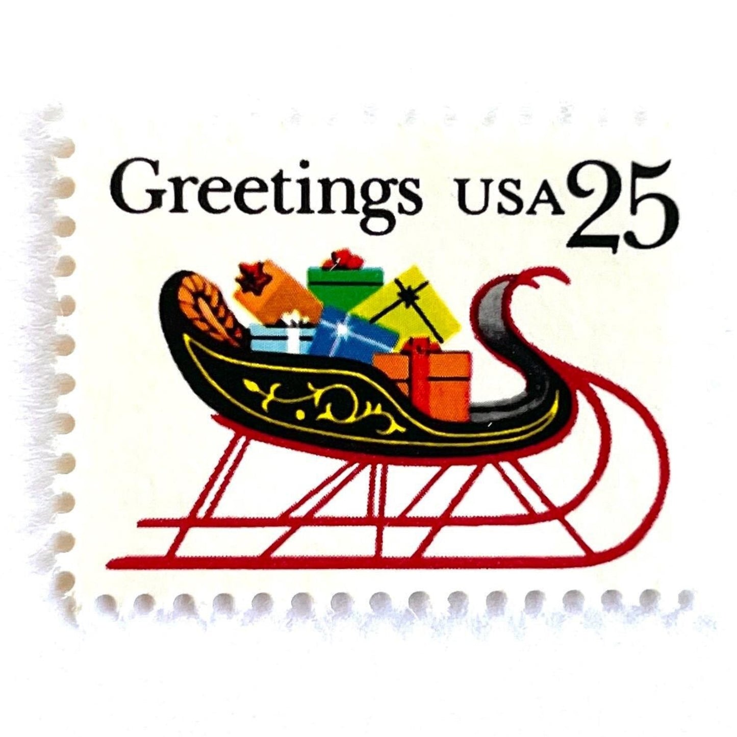 Image of 1989 Contemporary Christmas “Sleigh with Presents” 25-cent stamps. Scott #2428. Stamp Themes: Christmas, Holidays, Sleigh, Santa, Presents, Gifts, Greetings. Multicolored postage stamp.