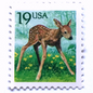 Image of four 19 cent Flora & Fauna Series 1991 Fawn stamps. Scott #2479. Stamp themes: Young Deer, Doe, Calf, Baby, Youth, Spring, Bambi, Birth. Green and blue postage stamp.