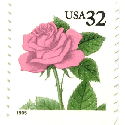 Vintage Pink Rose postage stamp from the 1995 Flora & Fauna series featuring a soft pink rose with green foliage on unused 32-cent USPS postage, Scott 2492.