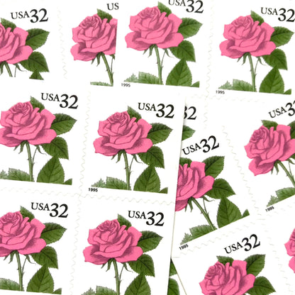 Vintage Pink Rose postage stamps from the 1995 Flora & Fauna series featuring a soft pink rose with green foliage on unused 32-cent USPS postage, Scott 2492.