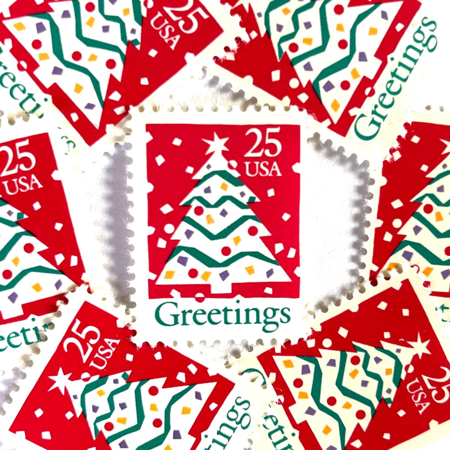 Image of 1990 Contemporary Christmas “Christmas Tree and Greetings” 25-cent stamps. Scott #2515. Stamp Themes: Christmas Decorations, Snow, Snowing, Greetings. Red, green, white postage stamp.