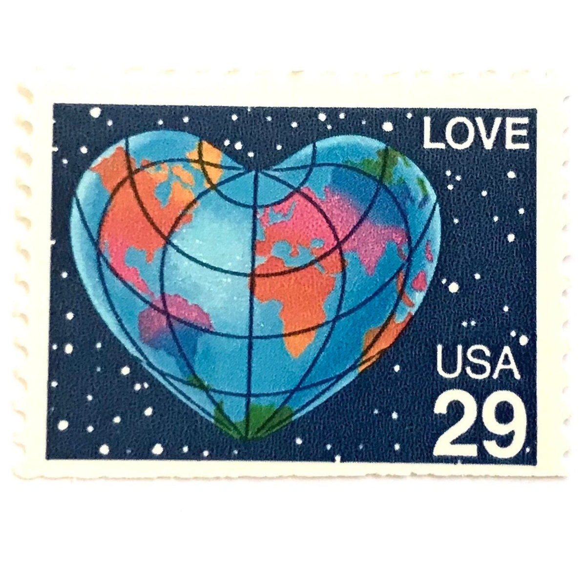 Heart-Shaped Globe postage stamp from 1991 featuring the Earth shaped like a heart with colorful continents on vintage unused 29-cent USPS postage, Scott 2535.