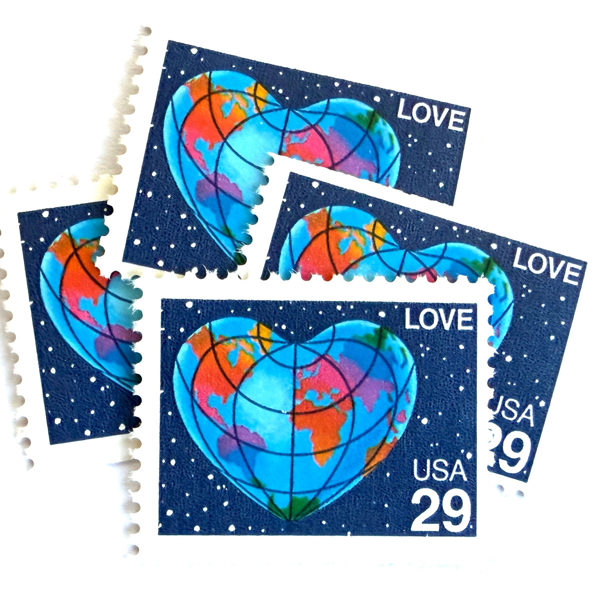 Heart-Shaped Globe postage stamps from 1991 featuring the Earth shaped like a heart with colorful continents on vintage unused 29-cent USPS postage, Scott 2535.