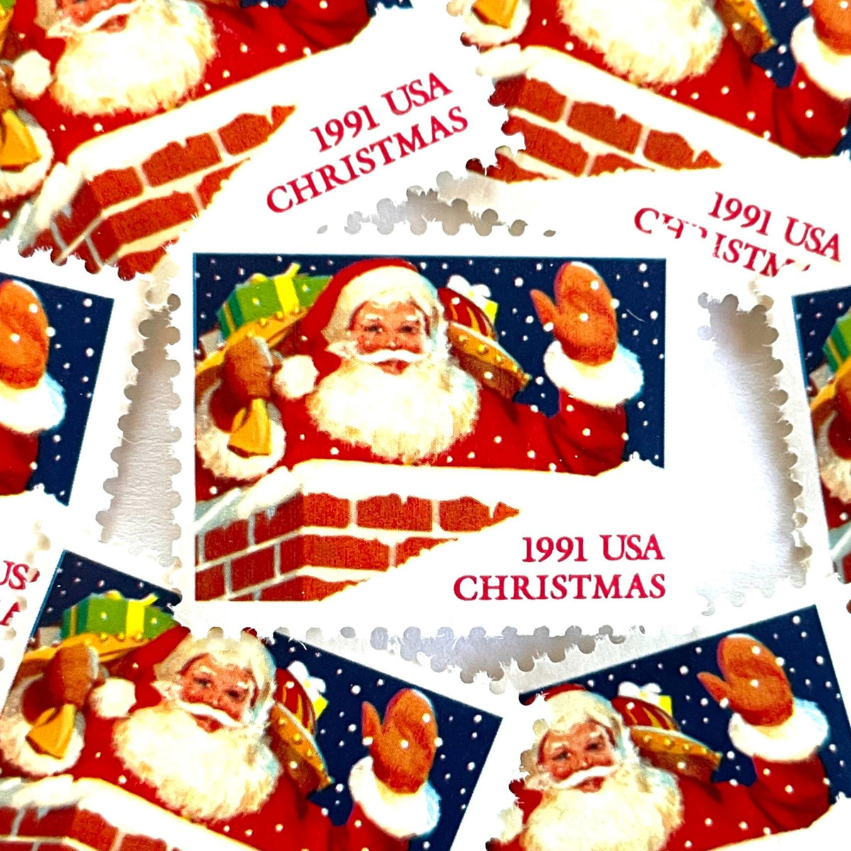 Vintage Santa Claus in Chimney Christmas postage stamps from the 1991 Contemporary Christmas series featuring Santa descending a chimney during his Christmas Eve journey on unused 29-cent USPS postage, Scott 2579.