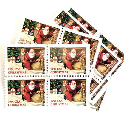 Image of 1991 Contemporary Christmas “Santa in Fireplace” 29-cent mail stamps. Scott #2584. Stamp Themes: Santa Claus, Christmas, Xmas, Hearth. Red/multicolored postage stamp.