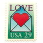 Love Envelope and Heart postage stamp from 1992 featuring a red heart emerging from an open blue envelope on vintage unused 29-cent USPS postage, Scott 2618.