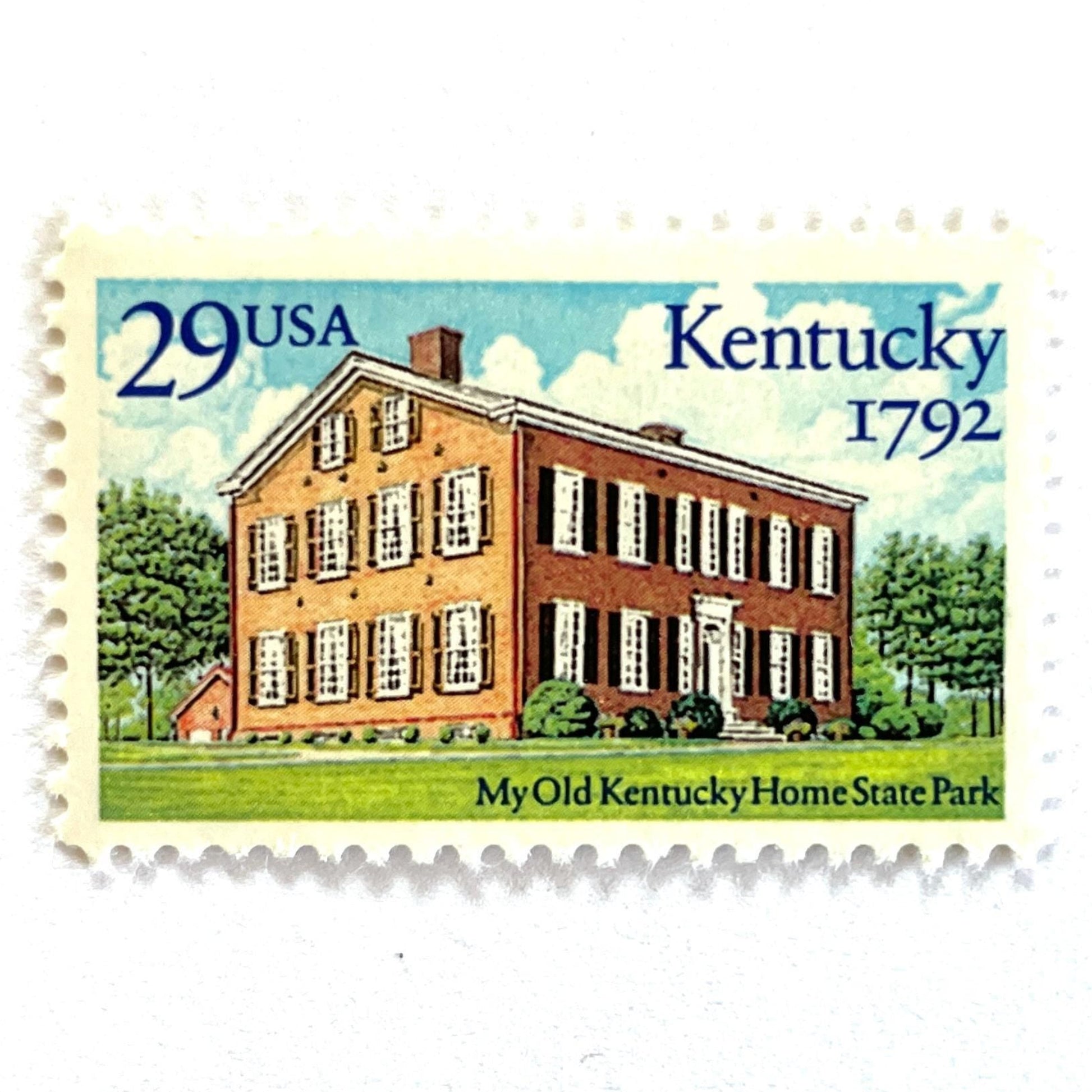 Image of a Kentucky Statehood postage stamps from 1992, featuring Federal Hill, the historic Bardstown home associated with the song "My Old Kentucky Home", on vintage unused 29-cent USPS postage, Scott 2636.