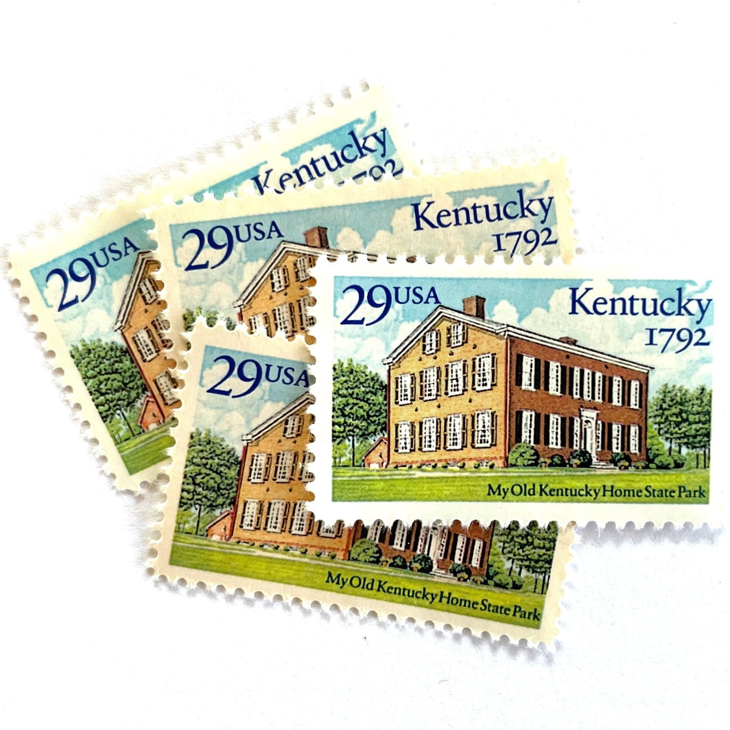Image of Kentucky Statehood postage stamps from 1992, featuring Federal Hill, the historic Bardstown home associated with the song "My Old Kentucky Home", on vintage unused 29-cent USPS postage, Scott 2636.