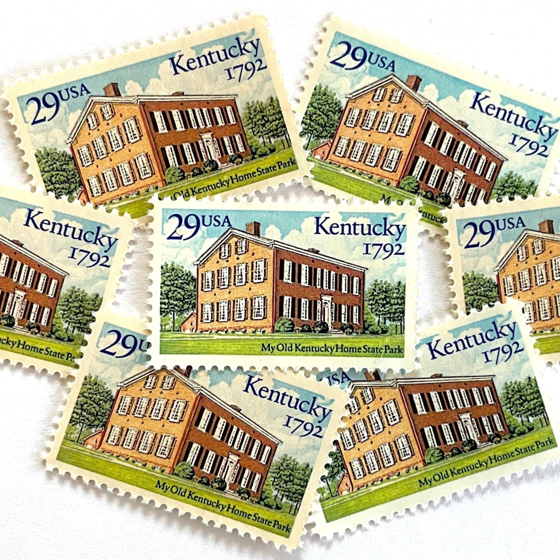 Image of Kentucky Statehood postage stamps from 1992, featuring Federal Hill, the historic Bardstown home associated with the song "My Old Kentucky Home", on vintage unused 29-cent USPS postage, Scott 2636.