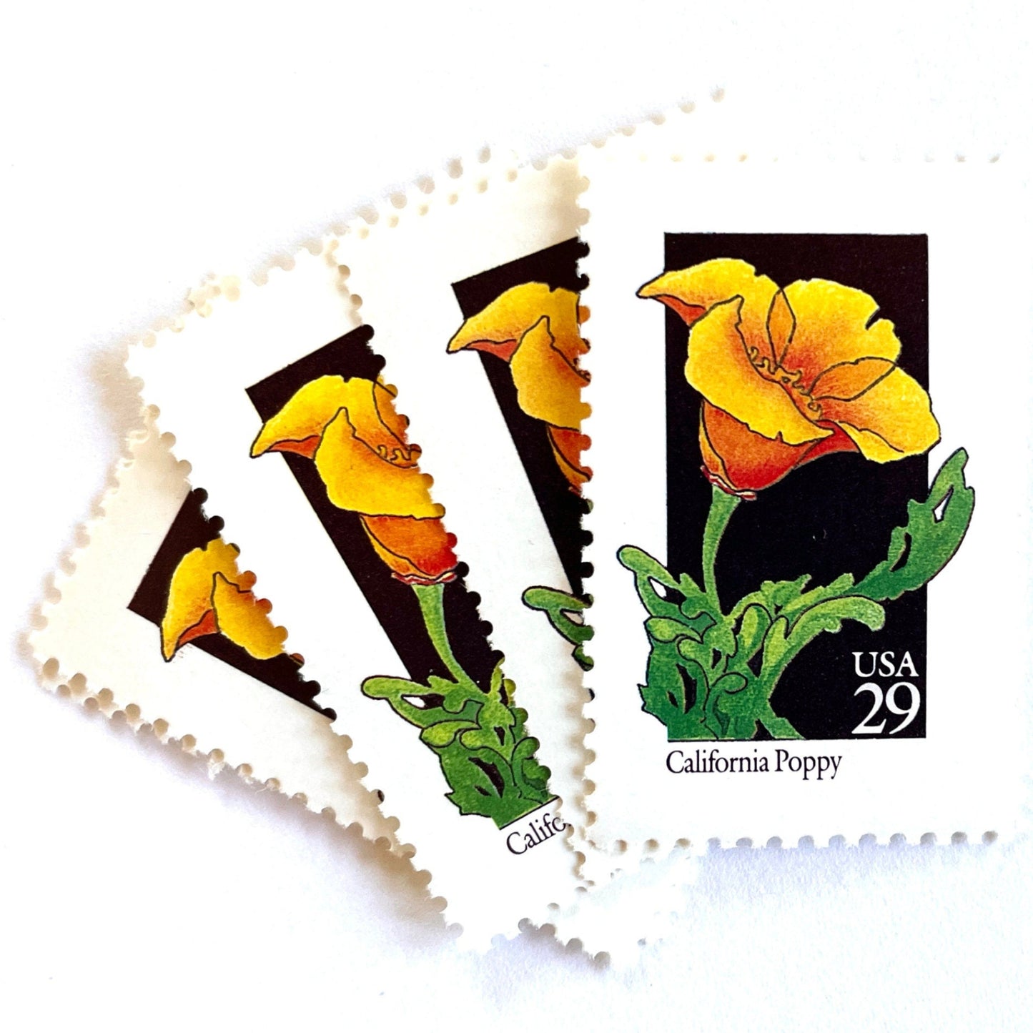 Image of 29-cent USPS postage stamps featuring an orange California Poppy flower from the 1992 American Wildflower Series (Scott #2651) California State Flower