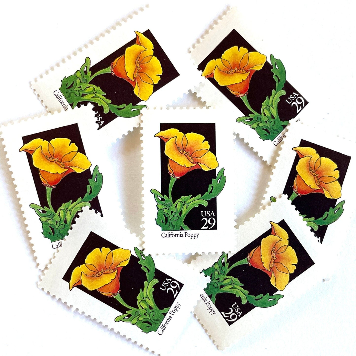 Image of 29-cent USPS postage stamps featuring an orange California Poppy flower from the 1992 American Wildflower Series (Scott #2651) California State Flower