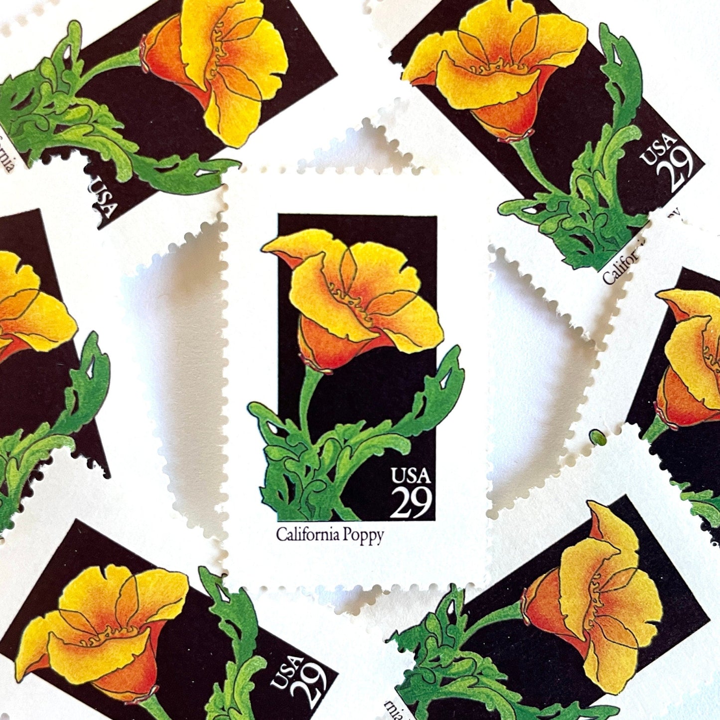 Image of 29-cent USPS postage stamps featuring an orange California Poppy flower from the 1992 American Wildflower Series (Scott #2651) California State Flower