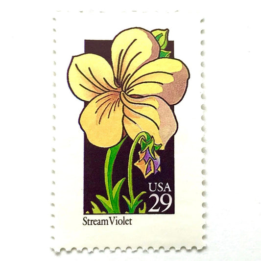 Image of 29-cent USPS postage stamp featuring a yellow Stream Violet flower from the 1992 American Wildflower Series (Scott #2655)