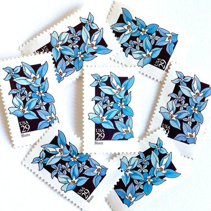 Image of 29-cent USPS postage stamps featuring a light blue Bluets flower from the 1992 American Wildflower Series (Scott #2656)