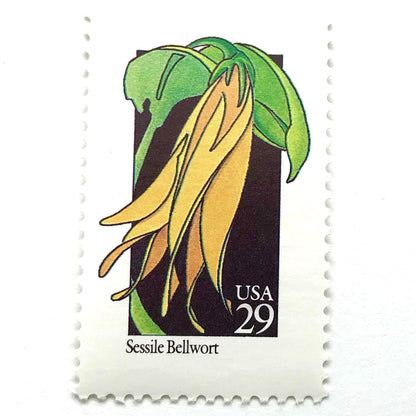 Image of 1992 American Wildflower Series “Sessile Bellwort ” vintage USPS mail stamps. Scott #2662. Stamp Themes: Plants, Flowers, Wildflowers, Flora. Yellow, Green, Black, Multicolored gummed postage stamp. Perfect postage stamp to use for save the date announcements, wedding invitation postage, bridal shower invitations, birth announcements, valentine’s day, thank you cards, and snail mail.