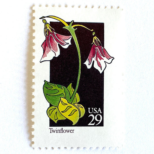 Image of 1992 American Wildflower Series “Twinflower” vintage USPS mail stamps. Scott #2665. Stamp Themes: Plants, Flowers, Wildflowers, Flora. Pink, White, Green, Multicolored gummed postage stamp. Perfect postage stamp to use for save the date announcements, wedding invitation postage, bridal shower invitations, birth announcements, valentine’s day, thank you cards, and snail mail.