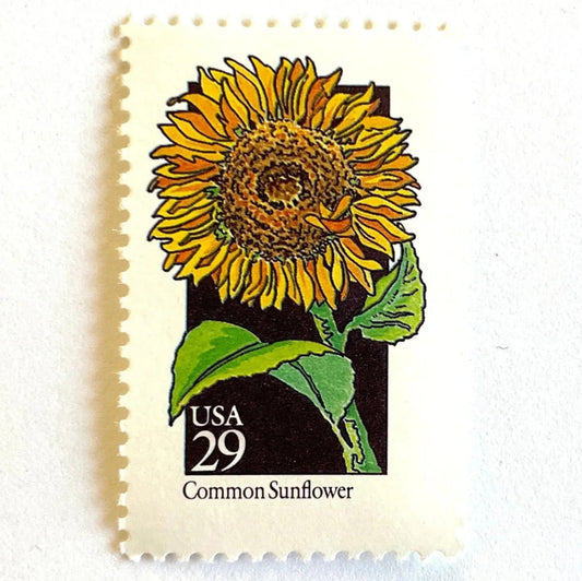 Image of 1992 American Wildflower Series “Common Sunflower” vintage USPS mail stamps. Scott #2666. Stamp Themes: Plants, Flowers, Wildflowers, Flora. Yellow, Orange, Green, Multicolored gummed postage stamp. Perfect postage stamp to use for save the date announcements, wedding invitation postage, bridal shower invitations, birth announcements, valentine’s day, thank you cards, and snail mail.