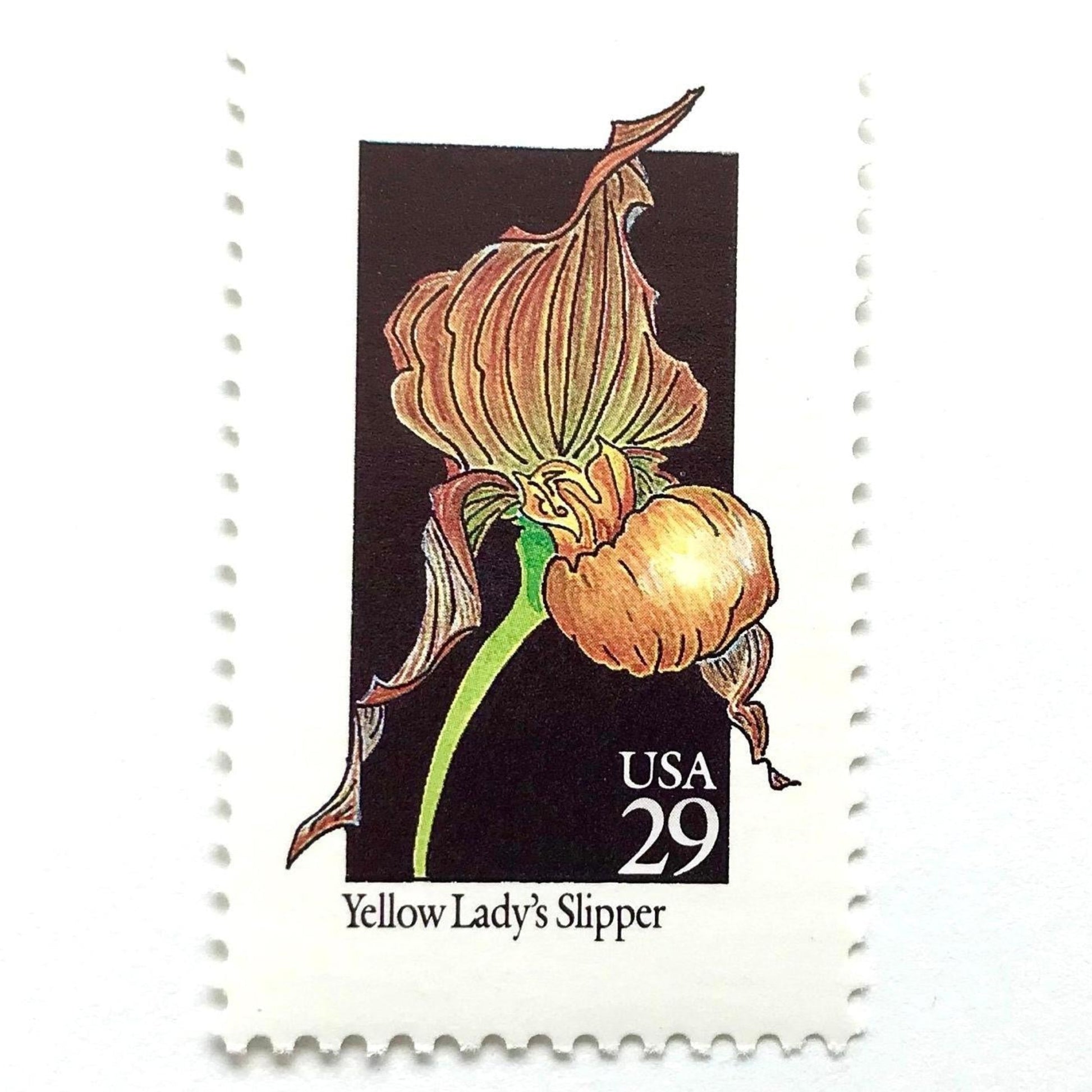 Image of 1992 American Wildflower Series “Yellow Lady's Slipper” vintage USPS mail stamps. Scott #2673. Stamp Themes: Plants, Flowers, Wildflowers, Flora. Yellow, Orange, Green, Multicolored gummed postage stamp. Perfect postage stamp to use for save the date announcements, wedding invitation postage, bridal shower invitations, birth announcements, valentine’s day, thank you cards, and snail mail.