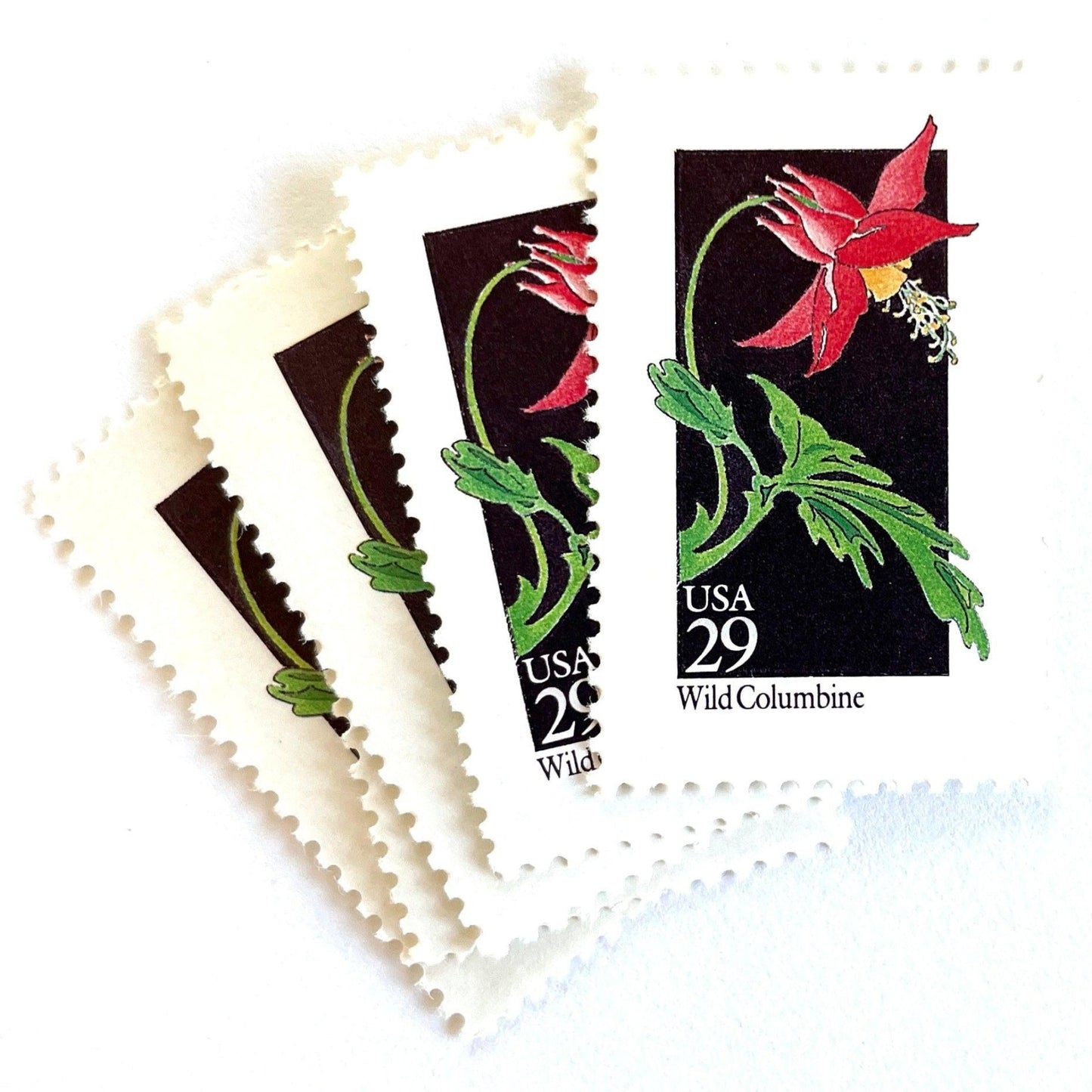Image of 1992 American Wildflower Series “Wild Columbine” vintage USPS mail stamps. Scott #2678. Stamp Themes: Plants, Flowers, Wildflowers, Flora. Red, Green, Yellow, Multicolored gummed postage stamp. Perfect postage stamp to use for save the date announcements, wedding invitation postage, bridal shower invitations, birth announcements, valentine’s day, thank you cards, and snail mail.