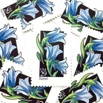 Image of 1992 American Wildflower Series “Harebell” vintage USPS mail stamps. Scott #2689. Stamp Themes: Plants, Flowers, Wildflowers, Flora. Blue, Green, Black, Multicolored gummed postage stamp. Perfect postage stamp to use for save the date announcements, wedding invitation postage, bridal shower invitations, birth announcements, valentine’s day, thank you cards, and snail mail.