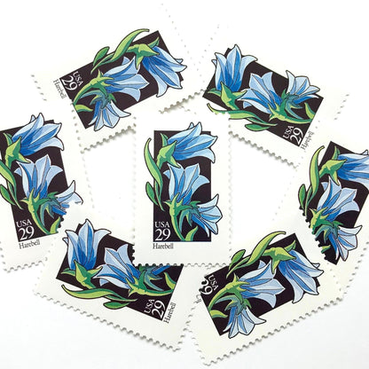 Image of 1992 American Wildflower Series “Harebell” vintage USPS mail stamps. Scott #2689. Stamp Themes: Plants, Flowers, Wildflowers, Flora. Blue, Green, Black, Multicolored gummed postage stamp. Perfect postage stamp to use for save the date announcements, wedding invitation postage, bridal shower invitations, birth announcements, valentine’s day, thank you cards, and snail mail.