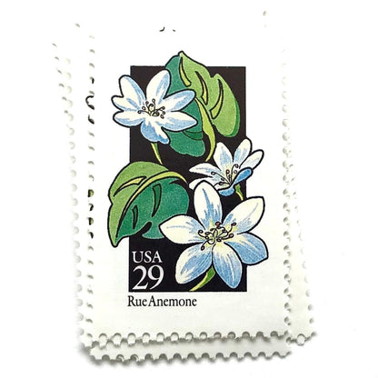 Image of 1992 American Wildflower Series “Rue Anemone” vintage USPS mail stamps. Scott #2694. Stamp Themes: Plants, Flowers, Wildflowers, Flora. White, Blue, Green, Multicolored gummed postage stamp. Perfect postage stamp to use for save the date announcements, wedding invitation postage, bridal shower invitations, birth announcements, valentine’s day, thank you cards, and snail mail.