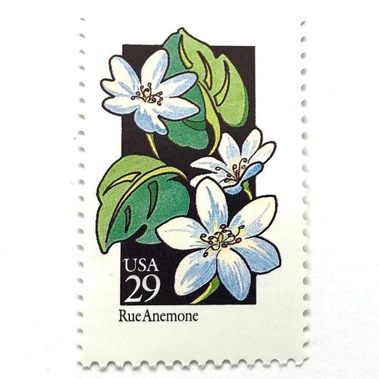 Image of 1992 American Wildflower Series “Rue Anemone” vintage USPS mail stamps. Scott #2694. Stamp Themes: Plants, Flowers, Wildflowers, Flora. White, Blue, Green, Multicolored gummed postage stamp. Perfect postage stamp to use for save the date announcements, wedding invitation postage, bridal shower invitations, birth announcements, valentine’s day, thank you cards, and snail mail.