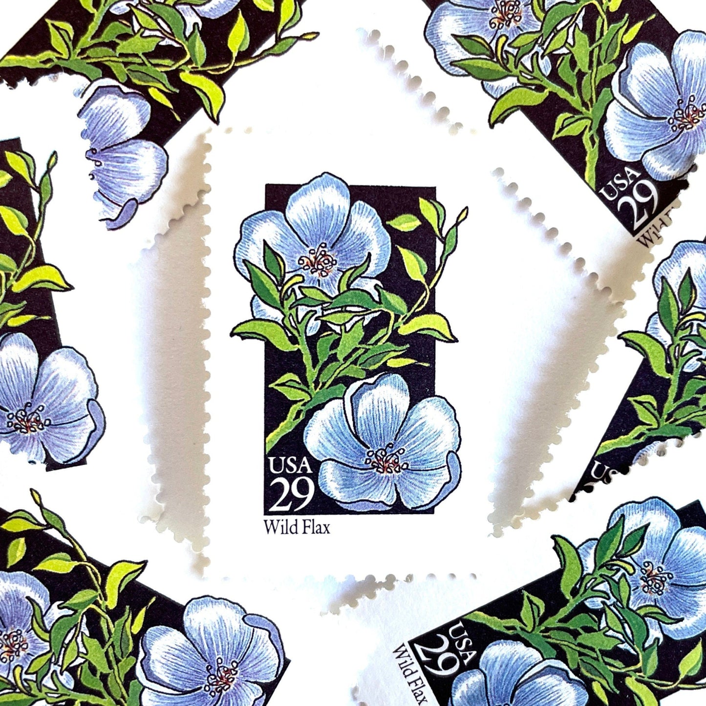 Image of 1992 American Wildflower Series “Wild Flax” vintage USPS mail stamps. Scott #2696. Stamp Themes: Plants, Flowers, Wildflowers, Flora. Blue, Green, Black, Multicolored gummed postage stamp. Perfect postage stamp to use for save the date announcements, wedding invitation postage, bridal shower invitations, birth announcements, valentine’s day, thank you cards, and snail mail.