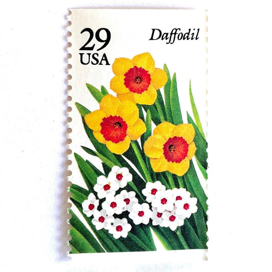 Image of vintage unused USPS Daffodil postage stamps from the 1993 Spring Garden Flowers series, featuring yellow daffodil blooms with green foliage, 29-cent face value, Scott 2761.