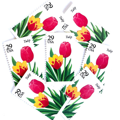 Image of Tulip postage stamps from the 1993 Spring Garden Flowers series, featuring red and yellow tulip blooms with green foliage on vintage unused 29-cent USPS postage, Scott 2762.